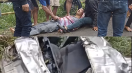 Salah satu korban mobil Suzuki Carry yang terjun ke jurang dievakuasi warga sementara bangkai mobil hingga siang ini masih dalam kondisi ringsek di dasar jurang Desa Wonosido, Minggu (21/6/26).
