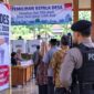 Sebanyak 34 desa yang akan menggelar Pilkades kini menjadi fokus pengawasan untuk mencegah konflik oleh aparat keamanan, Rabu (15/7/26). Foto : Ilustrasi AI