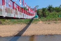 Munculnya wacana penempatan kotak amal di ujung jembatan Garuda Merah Putih di sisi Dukuh Sibetok mulai dibahas demi menghindari pungli, Kamis (23/7/26).