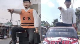 Ogoh-ogoh merujuk karakter Bupati Pemalang nonaktif Anom Widiyantoro memakai rompi KPK berubah memakai kemeja putih ramai dibagikan di media sosial, Sabtu (22/8/26). Foto: Istimewa