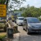 Penyempitan jalan di Jembatan Gambyang Kecamatan Subah menjadi biang kerok kemacetan akses menuju dan keluar dari KITB, Senin (31/8/26). Foto: Ilustrasi AI