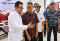 Anggota DPR RI Rizal Bawazier saat bertemu para ketua RW di Aula Kelurahan Panjang Baru, Kamis (17/9/26). Foto: Ilustrasi AI