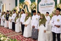 Sebanyak 21 pasangan melangsungkan nikah massal di Gedung Kanzus Sholawat Kota Pekalongan, Sabtu (19/9/26). Foto: Istimewa & Ilustrasi AI